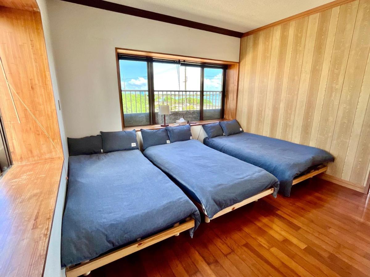 バーベキューもできる! 海と浜比嘉大橋を一望できる宿 Henza Exterior foto